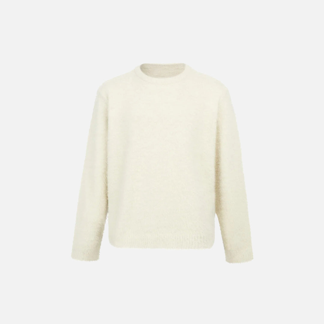 Front view of the apricot Classic Crew Neck Sweater in a gray background
