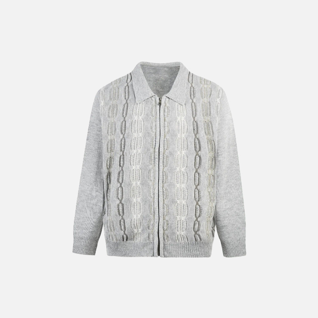 Front view of the gray Cable Knit Zip-Up Sweater in a gray background 