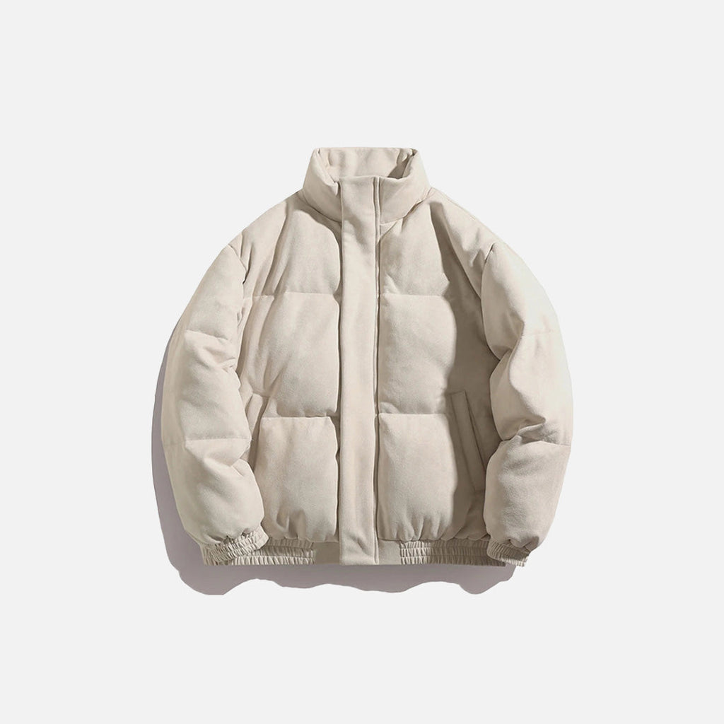 Front view of the beige Arctic Shield Puffer Jacket in a gray background
