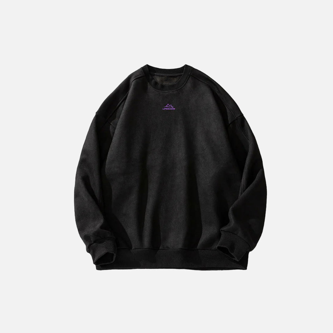 Front view of the black Y2K Peak Drift Sweatshirt in a gray background