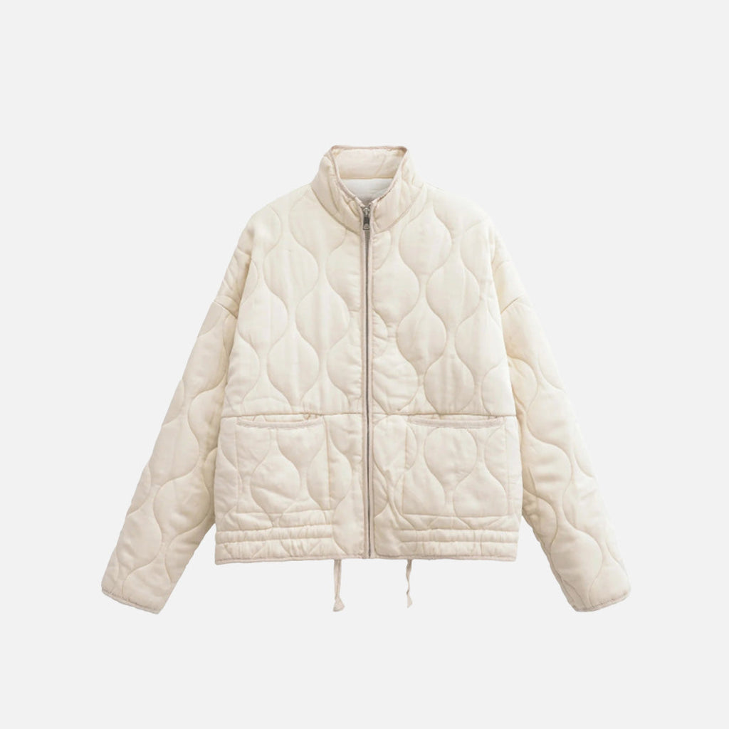 Front view of the beige Quilted Zip-Up Jacket in a gray background