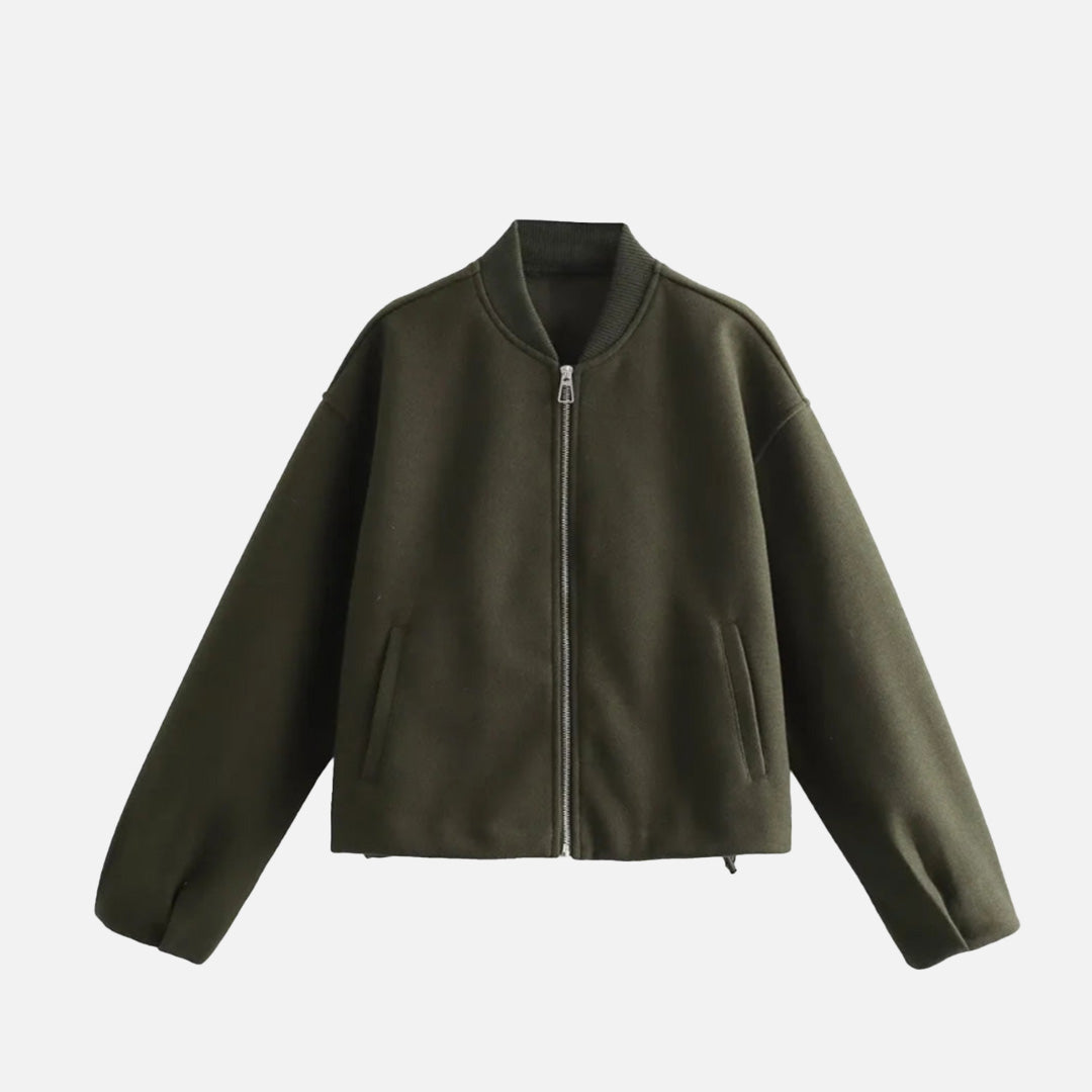 Front view of the army green Ethereal Quilted Embrace Jacket in a gray background