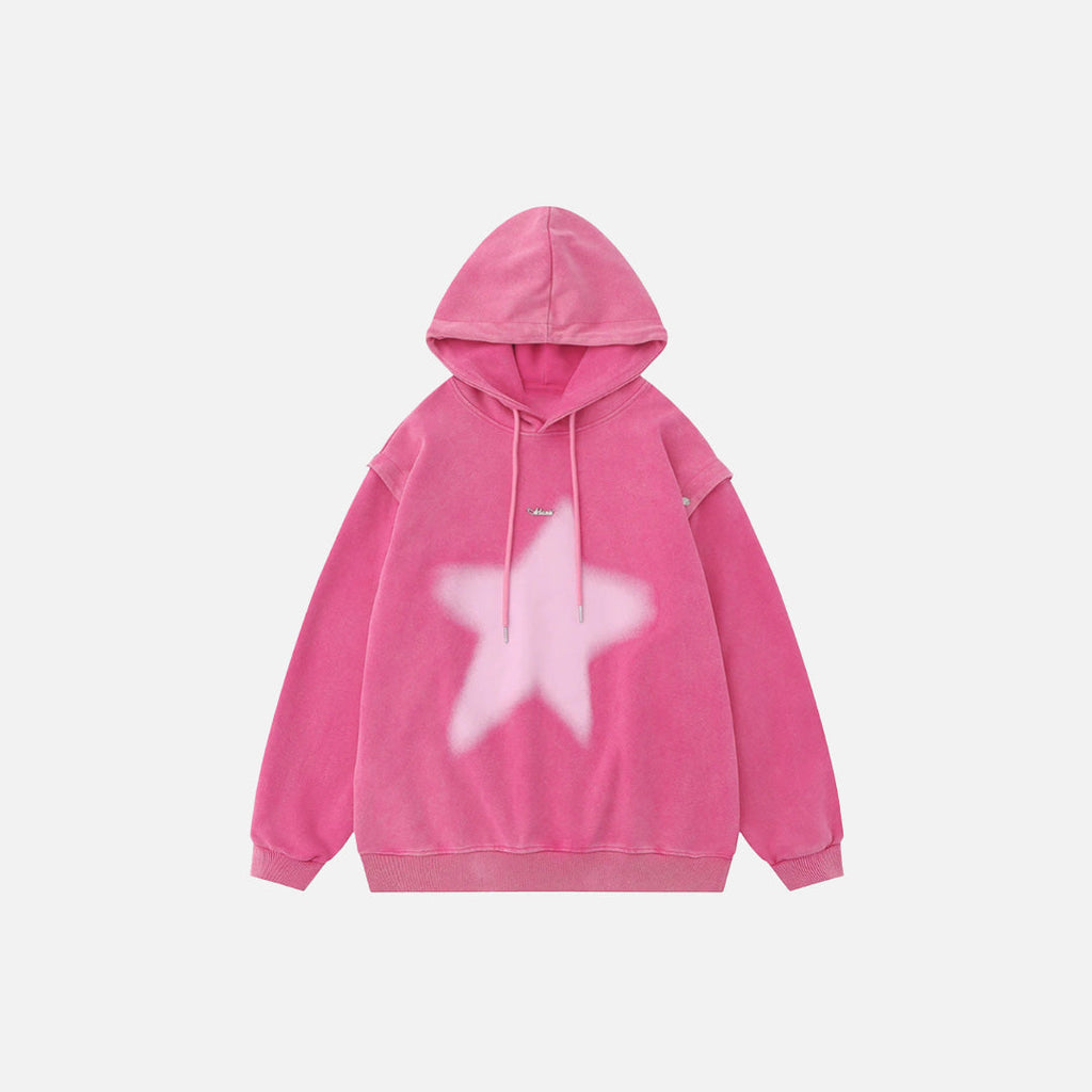 Front view of the pink Celestial Star Hoodie in a gray background