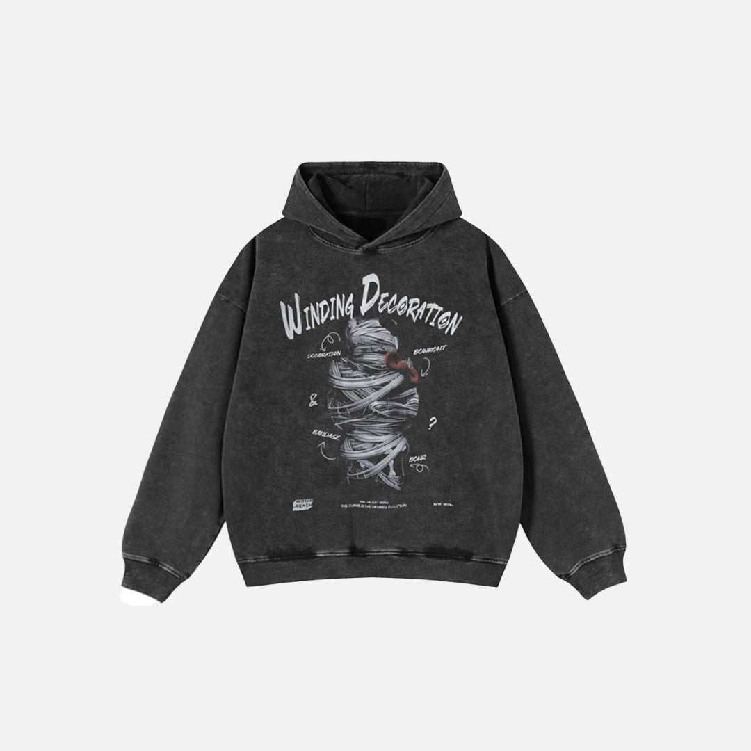 Front view of the black Winding Decoration Wrapped Hoodie in a gray background
