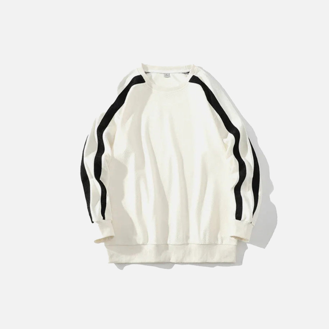 Front view of the beige Y2K Edge Track Sweatshirt in a gray background