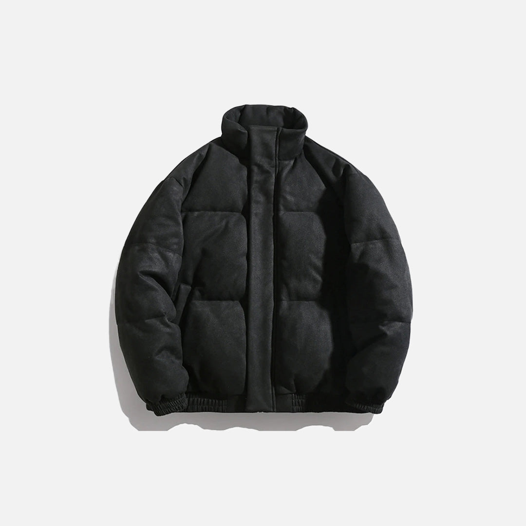 Front view of the black Arctic Shield Puffer Jacket in a gray background