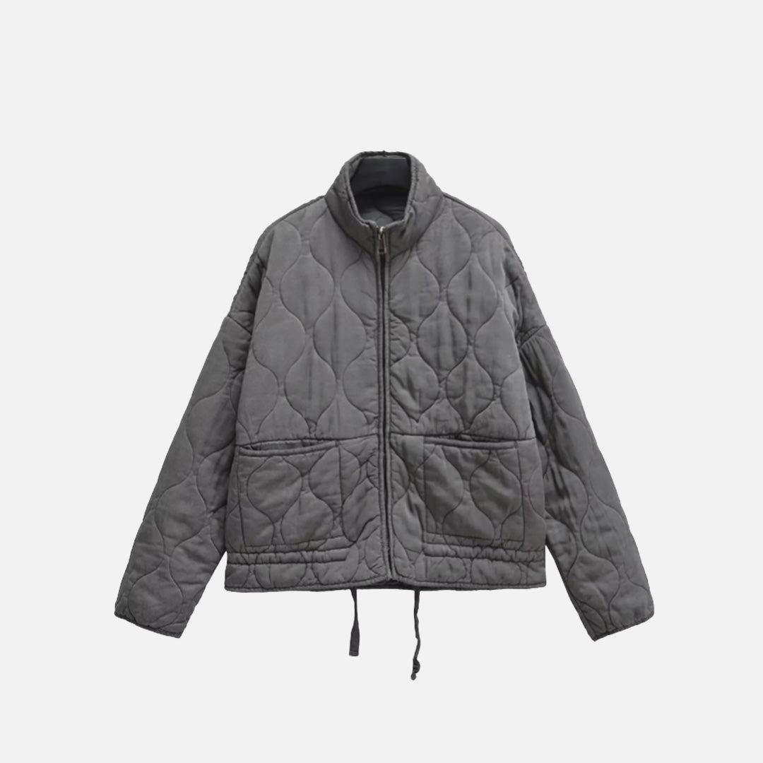 Front view of the gray Quilted Zip-Up Jacket in a gray background