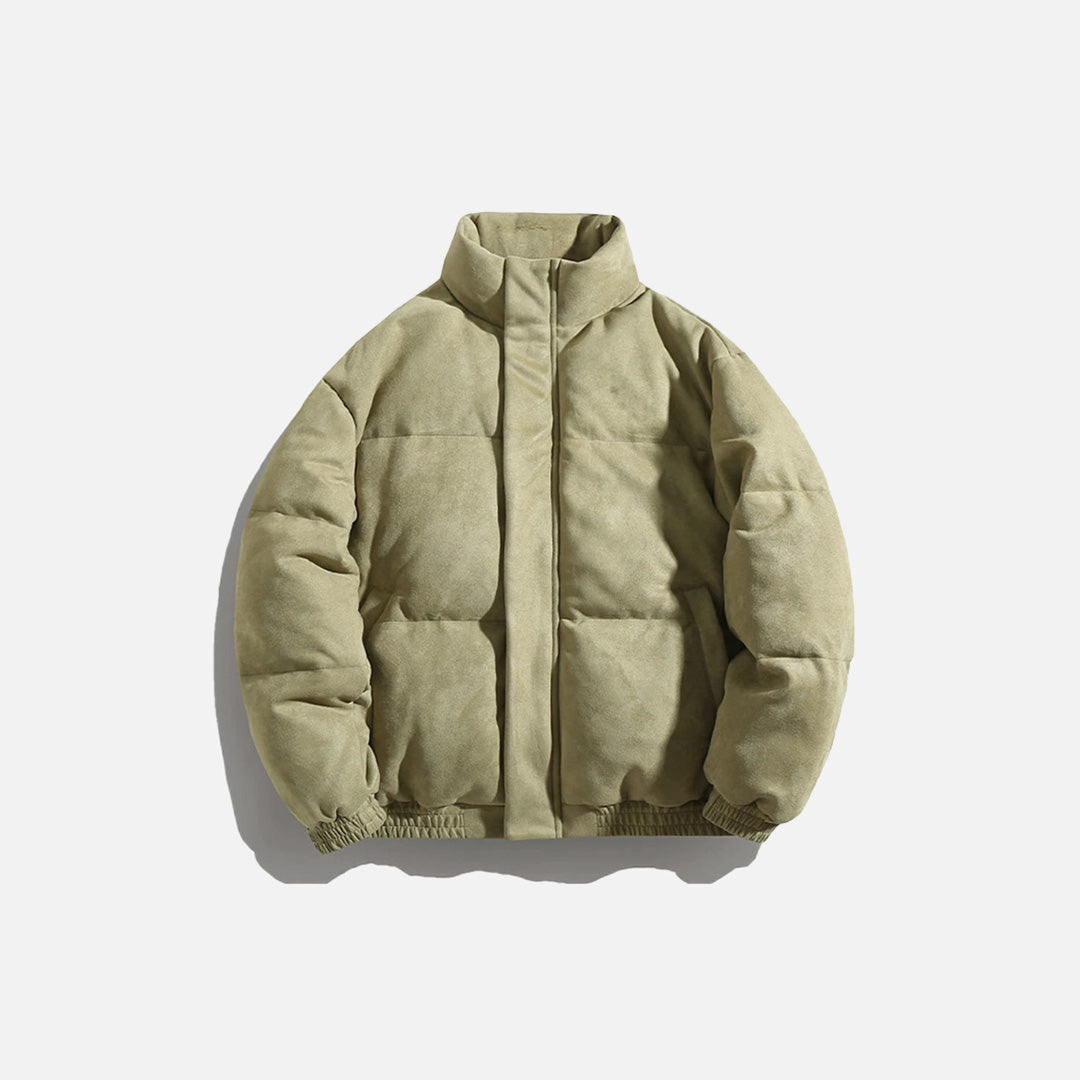 Front view of the green Arctic Shield Puffer Jacket in a gray background