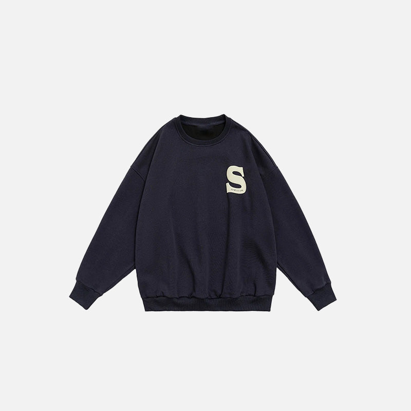 Front view of the navy blue S Foaming Print Sweatshirt in a gray background