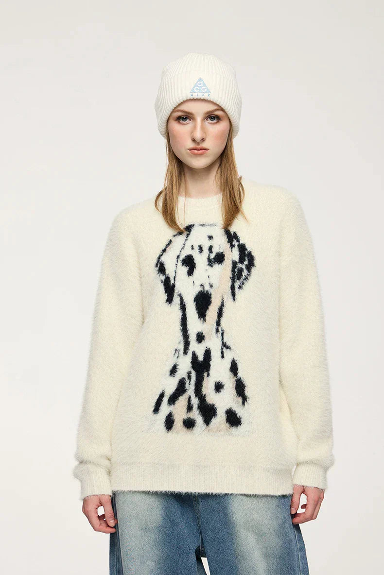 Model wearing the apricot Dalmation Graphic Sweater