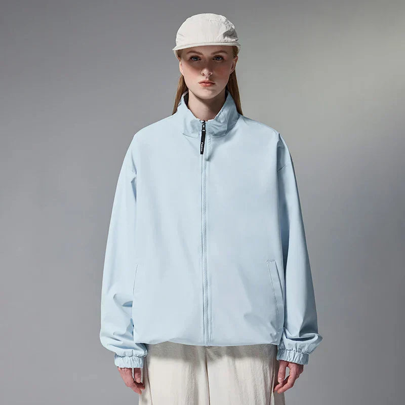 Model wearing the blue Minimalist Zip-Up Jacket 