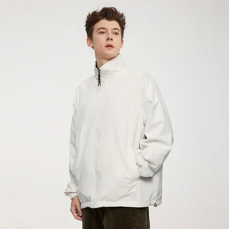 Model wearing the khaki Minimalist Zip-Up Jacket 